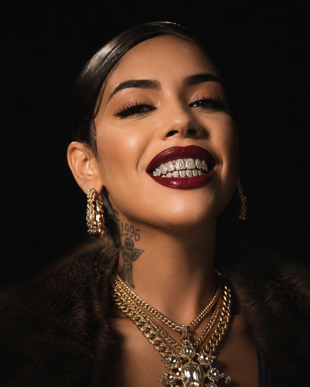 Woman smiling with an iced out diamond grill