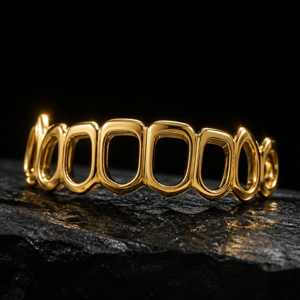 Open face 14k gold grillz with enamel showing through the windows